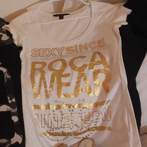 Form fitting. Busty. Roca wear shirt